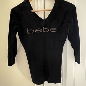 Black Bebe V-Neck Sweater, three quarter inch sleeve.
